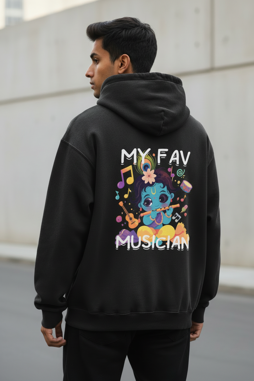 Person wearing a Krishna Musician Heavyweight Oversized Hoodie showcasing vibrant back graphic design.